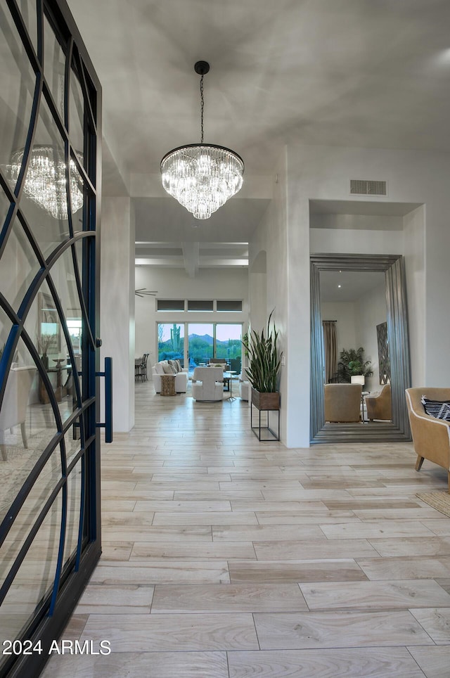 30600 N Pima Rd Unit 49, Scottsdale, AZ 85266 - interior space featuring wood finished floors, visible vents, and a chandelier