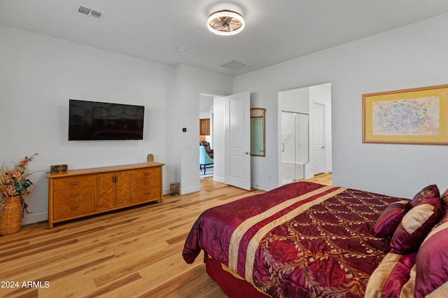 bedroom with light hardwood / wood-style floors