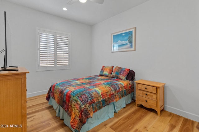 bedroom featuring ceiling fan and light wood-type flooring