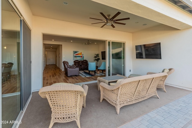 view of patio featuring ceiling fan and an outdoor hangout area