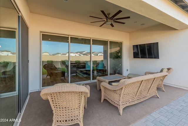 view of patio / terrace featuring ceiling fan