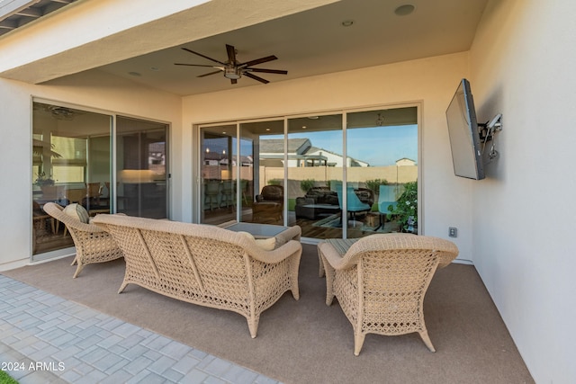 view of patio featuring ceiling fan