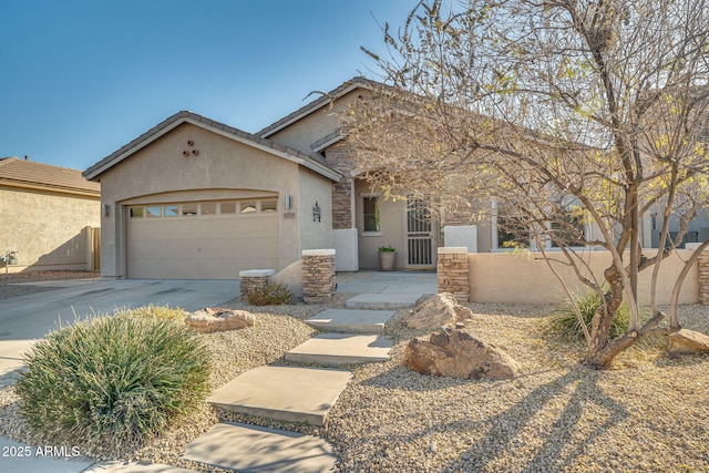 view of front of property with a garage