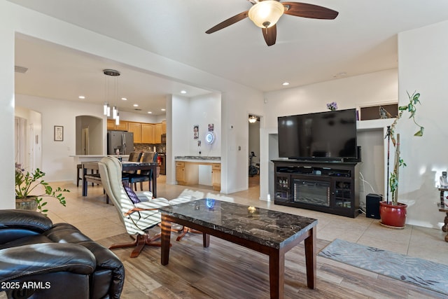 living room with ceiling fan