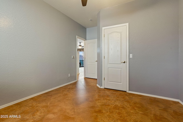 spare room featuring ceiling fan