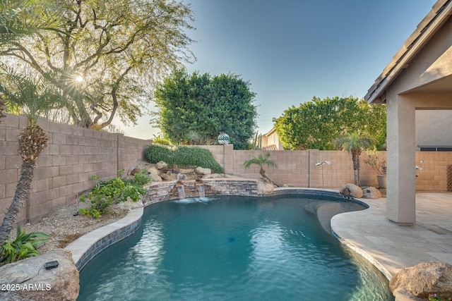 view of pool with pool water feature