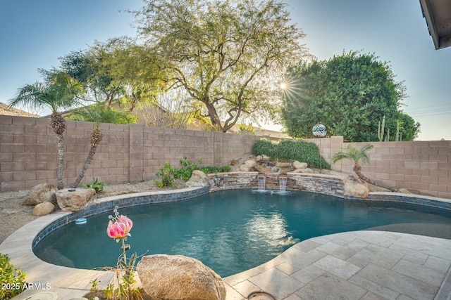 view of swimming pool featuring pool water feature