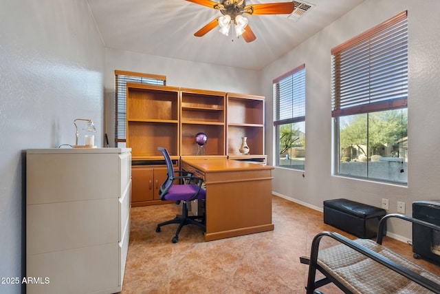 office area with ceiling fan