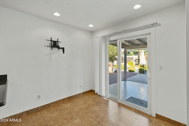 unfurnished dining area with light tile patterned floors