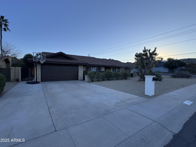 single story home with a garage