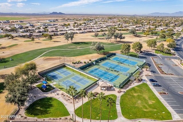 birds eye view of property with a mountain view