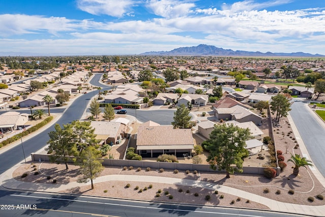 birds eye view of property featuring a mountain view