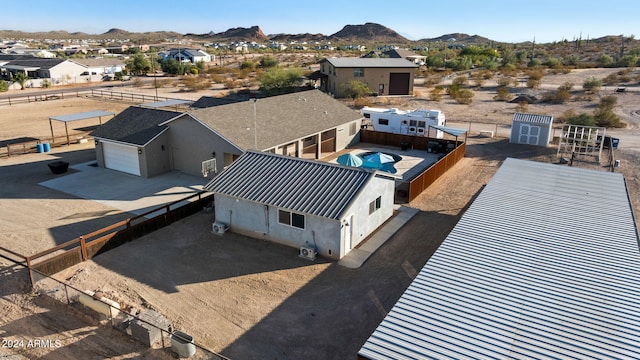 drone / aerial view featuring a mountain view