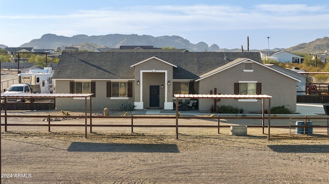 view of front facade featuring a mountain view