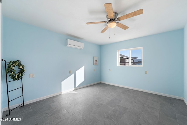 empty room featuring ceiling fan and a wall mounted air conditioner