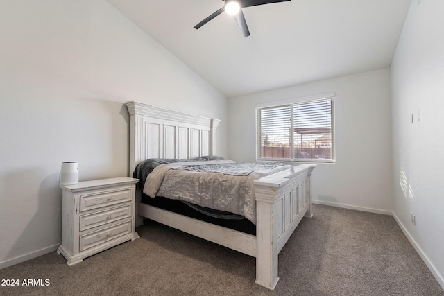 carpeted bedroom featuring ceiling fan and vaulted ceiling