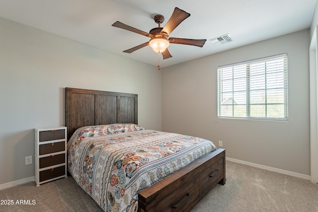 bedroom featuring carpet floors, baseboards, and ceiling fan
