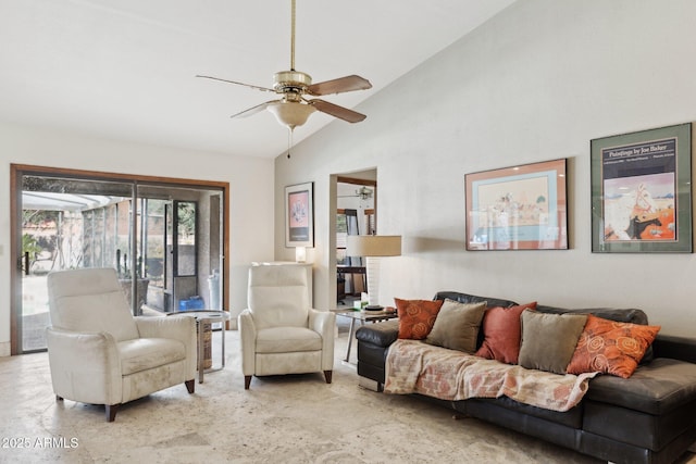 living room featuring a ceiling fan and high vaulted ceiling