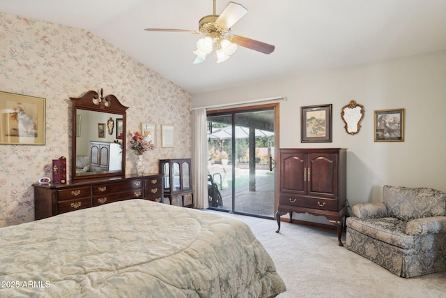 bedroom featuring carpet flooring, access to exterior, wallpapered walls, lofted ceiling, and a ceiling fan