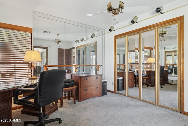 office area featuring a ceiling fan and carpet flooring