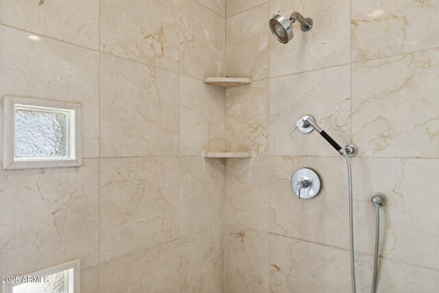 bathroom view of tiled shower