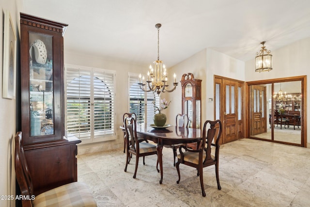 dining room featuring a chandelier