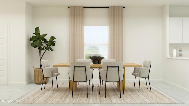 dining space with baseboards