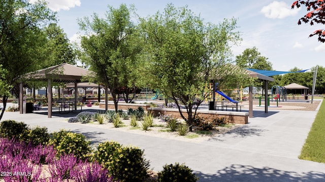 view of property's community featuring playground community and a gazebo