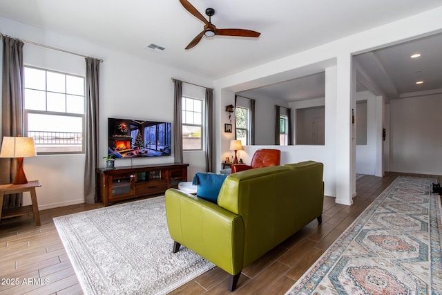 living room featuring ceiling fan