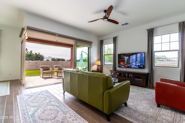 living room with ceiling fan