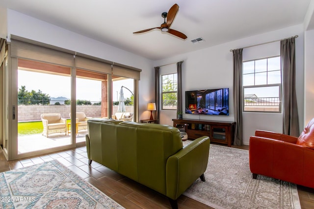 living room featuring ceiling fan