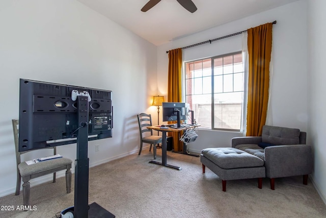 living area featuring ceiling fan, carpet, and vaulted ceiling