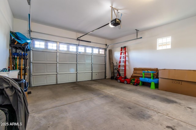 garage featuring a garage door opener