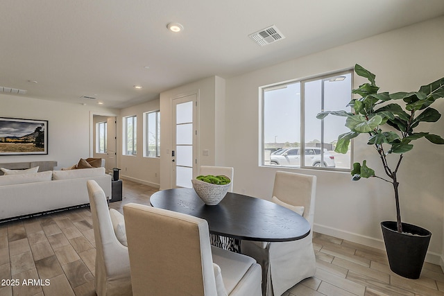 2121 W Sonoran Desert Dr Unit 86, Phoenix, AZ 85085 - dining space with wood tiled floors and recessed lighting