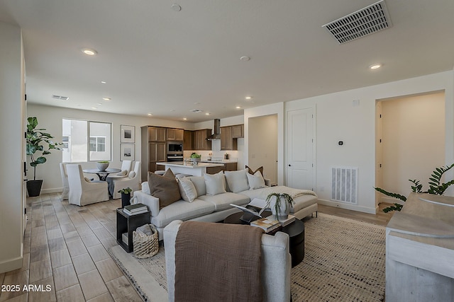 2121 W Sonoran Desert Dr Unit 86, Phoenix, AZ 85085 - living area featuring recessed lighting and light wood-type flooring