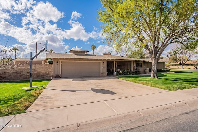 single story home featuring a front lawn and a garage