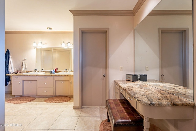 bathroom featuring ornamental molding, tile patterned flooring, and vanity