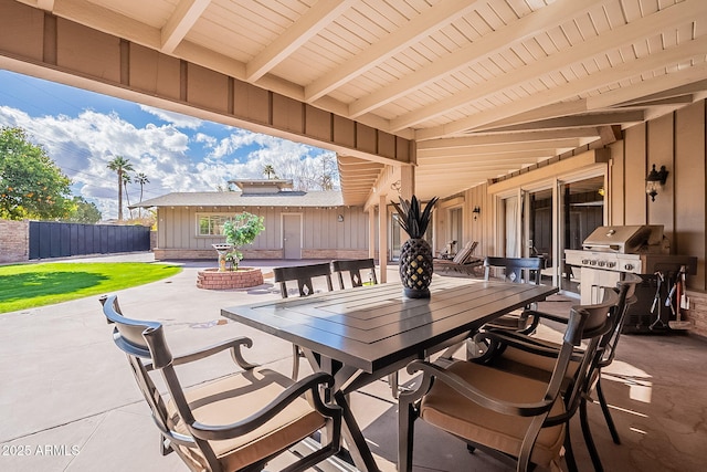 view of patio featuring a grill