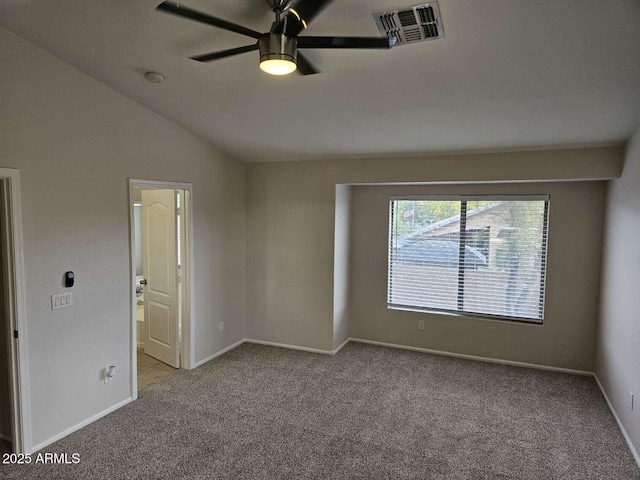4613 W Fawn Dr, Laveen, AZ 85339 - empty room featuring vaulted ceiling, ceiling fan, carpet flooring, and visible vents