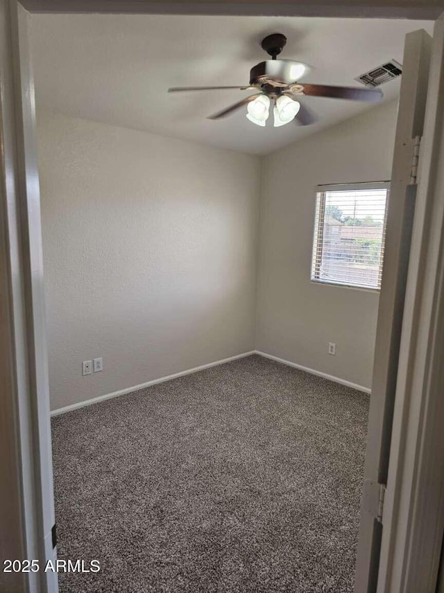4613 W Fawn Dr, Laveen, AZ 85339 - carpeted spare room featuring baseboards, a ceiling fan, and visible vents