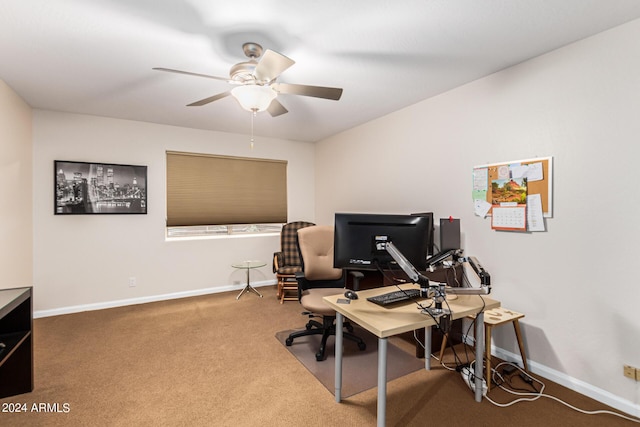 office space with carpet floors and ceiling fan