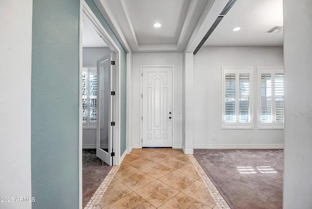 view of tiled foyer entrance