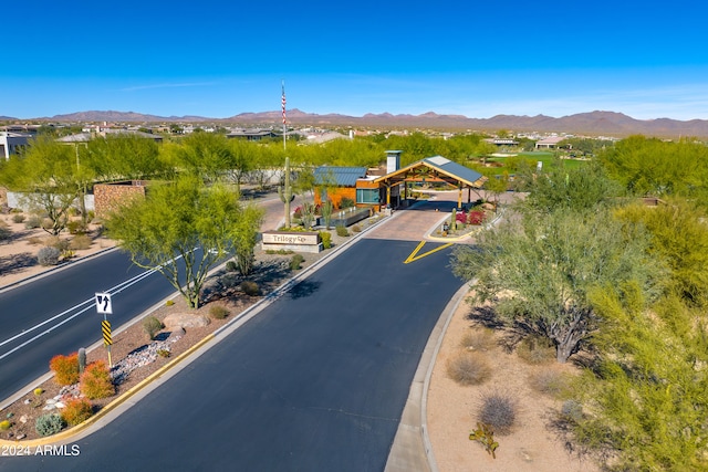 birds eye view of property with a mountain view