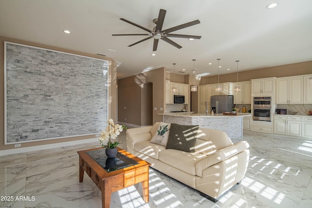 living area featuring a ceiling fan, recessed lighting, marble finish floor, and visible vents