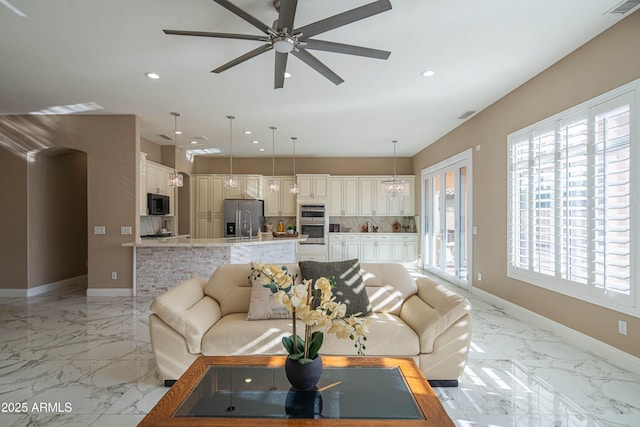 living room with marble finish floor, recessed lighting, visible vents, ceiling fan, and baseboards