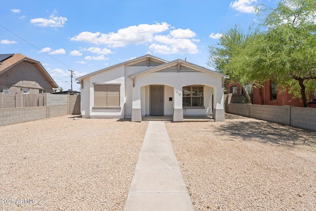 1510 W Fillmore St, Phoenix, AZ 85007 - view of front of property featuring covered porch, stucco siding, and a fenced backyard
