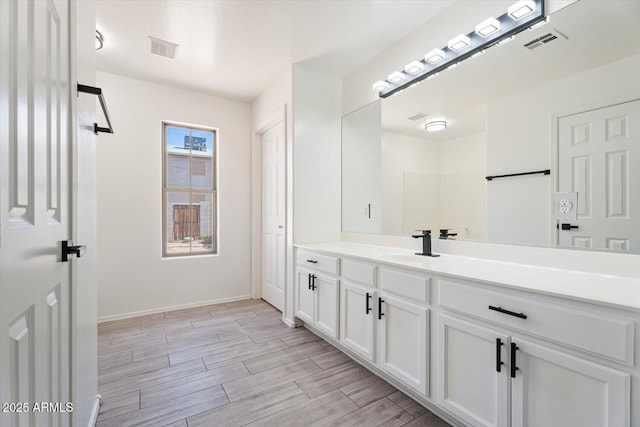 1510 W Fillmore St, Phoenix, AZ 85007 - bathroom with vanity and wood finished floors