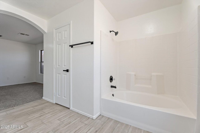 1510 W Fillmore St, Phoenix, AZ 85007 - bathroom featuring shower / bath combination and wood finished floors