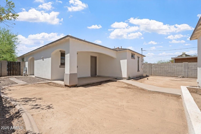 1510 W Fillmore St, Phoenix, AZ 85007 - back of property with a patio and stucco siding