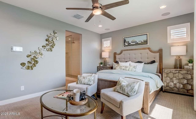 bedroom with ceiling fan and light colored carpet